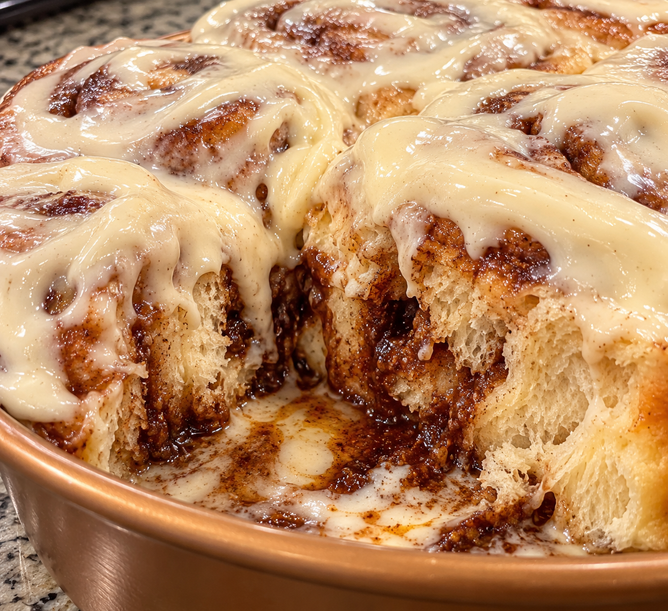 Gooey pull-apart cinnamon roll with cream cheese frosting